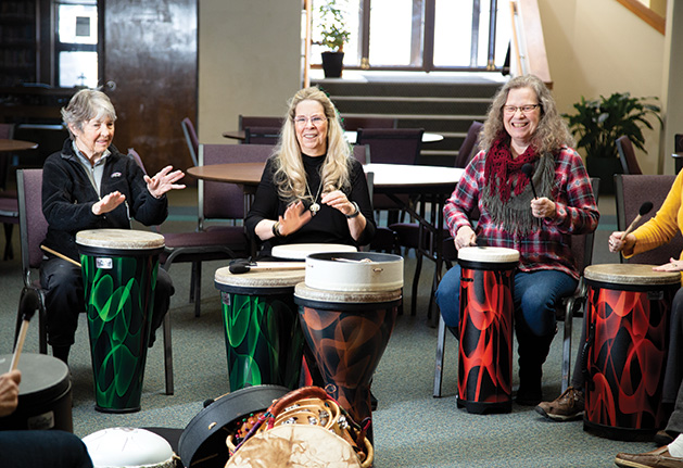 A circle of seniors drum at HealthRHYTHMS at White Bear Lake's Redeemer Lutheran Church