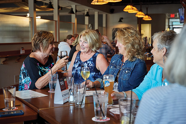 Members of the White Bear Lake Social Meetup enjoy drinks at happy hour.
