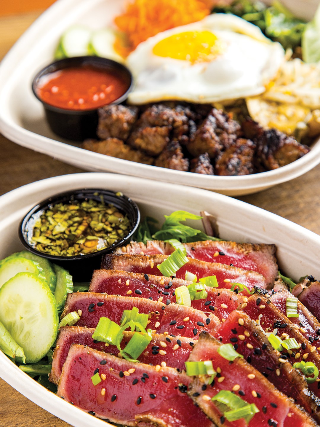 Tuna Tataki (front) and Kalbi Bibimbap (back).