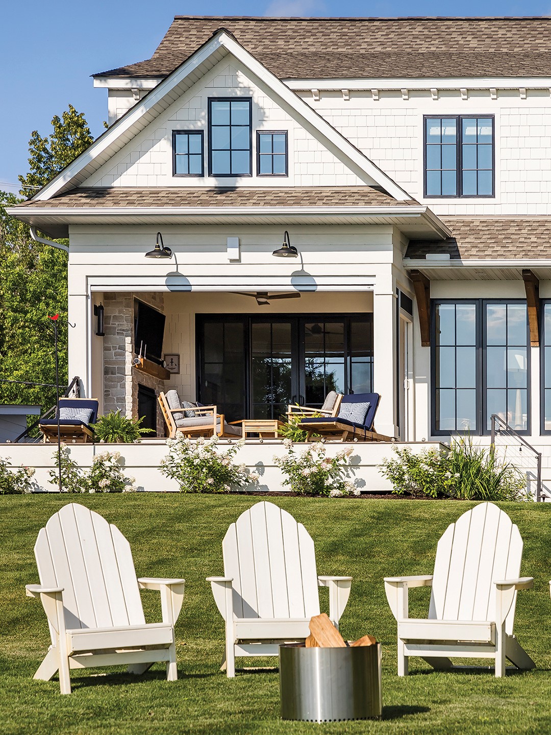 A cozy fire pit looks out onto White Bear Lake.