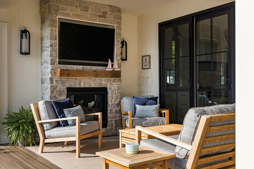  A three-season porch creates an intimate gathering area for lakeside lounging.