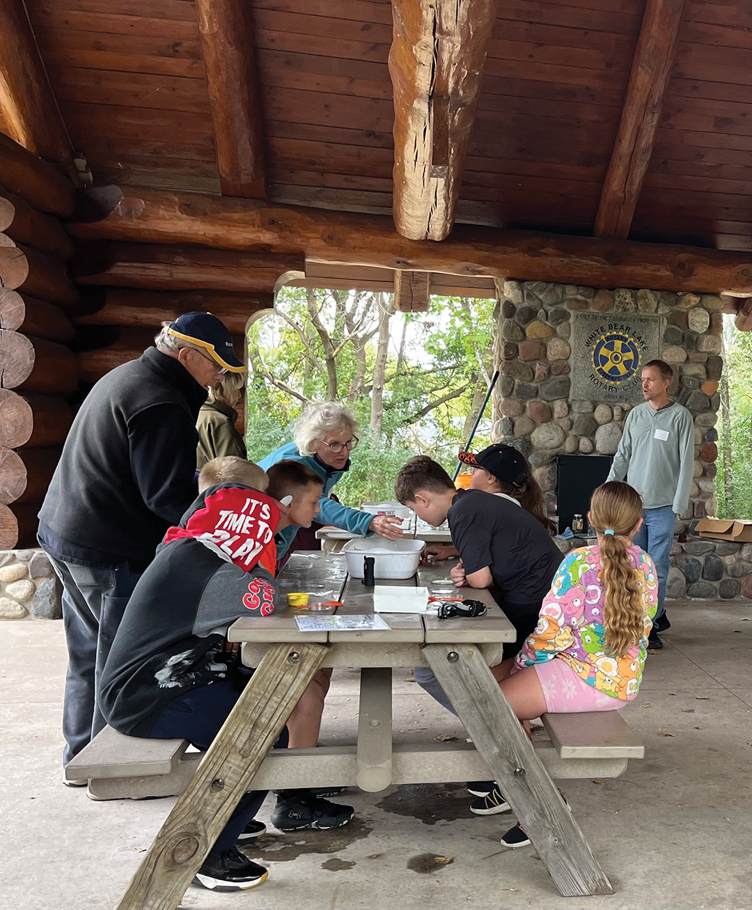 Rotarians and community members working and learning at the Rotary Nature Preserve.