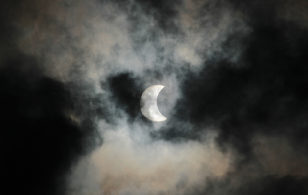Clouds passing in front of the moon