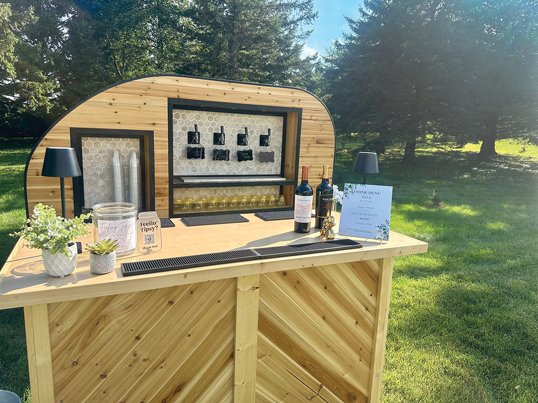 The Tapper Trailer, a mobile bar by Tipsi ’Tini Events, has a chic, elevated look and is run off of ice, so it doesn’t require any electrical hookup. 