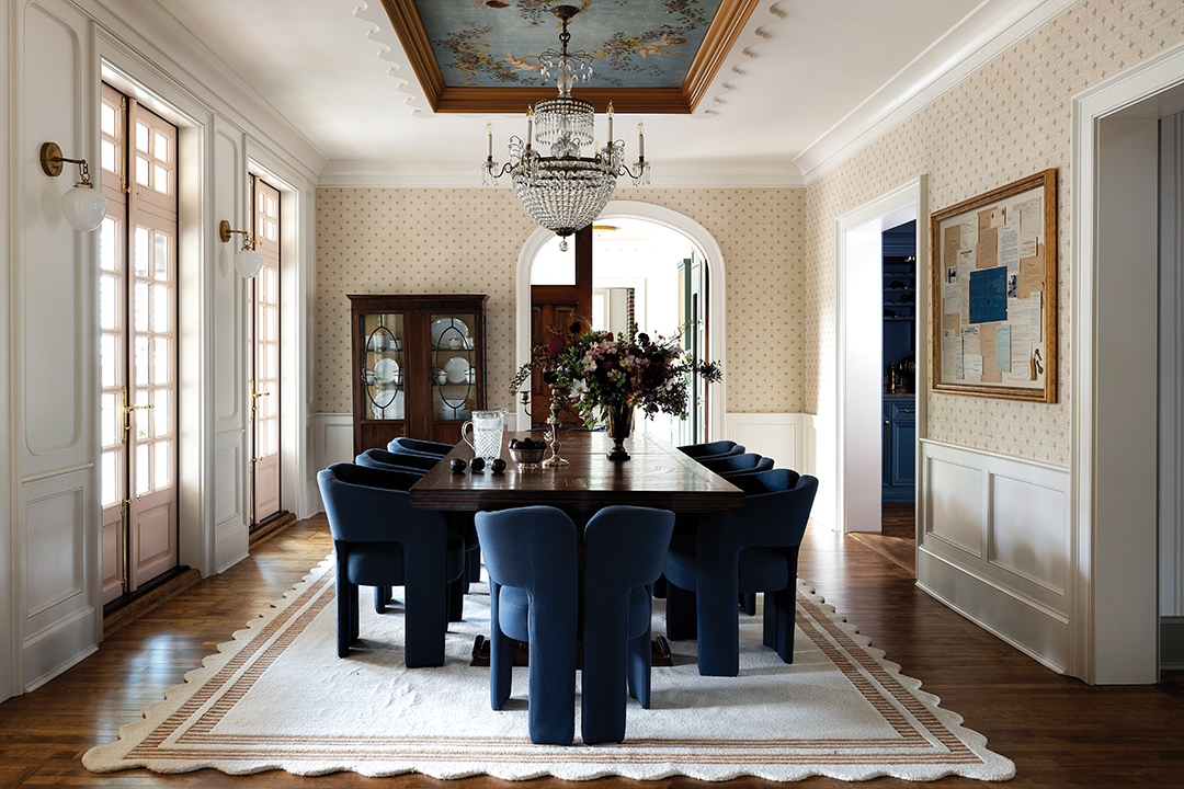 The historic summer home was originally oriented toward the lake, where its first residents, the family of former U.S. Secretary of State Frank Kellogg, arrived by ferry. (F. Scott Fitzgerald is rumored to have played tennis on the property.) Blue Pencil Collective reoriented the home, and bi-fold windows in the dining room now open to a new facade.
