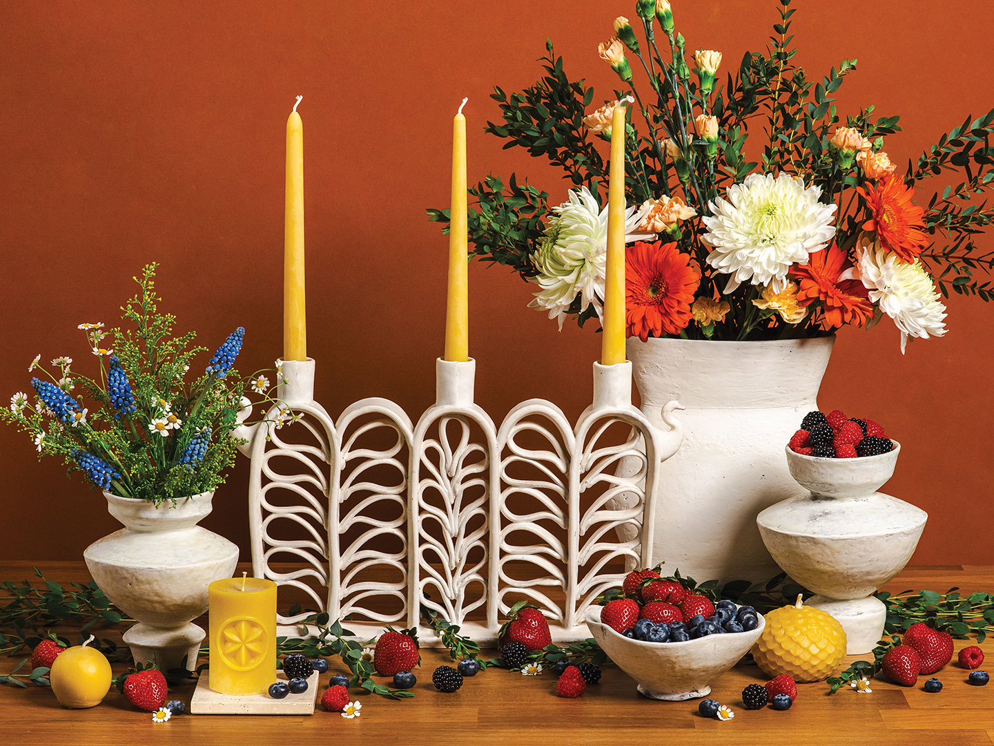 Romanticize your seasonal table with a display that highlights the bounty of a St. Croix Valley summer—featuring berries, blooms and locally made art and home goods. Pottery by Maggie Jaszczak, maggiejaszczak.com Candles by Hilltop Handmade Goods, @hilltopgoodsmn