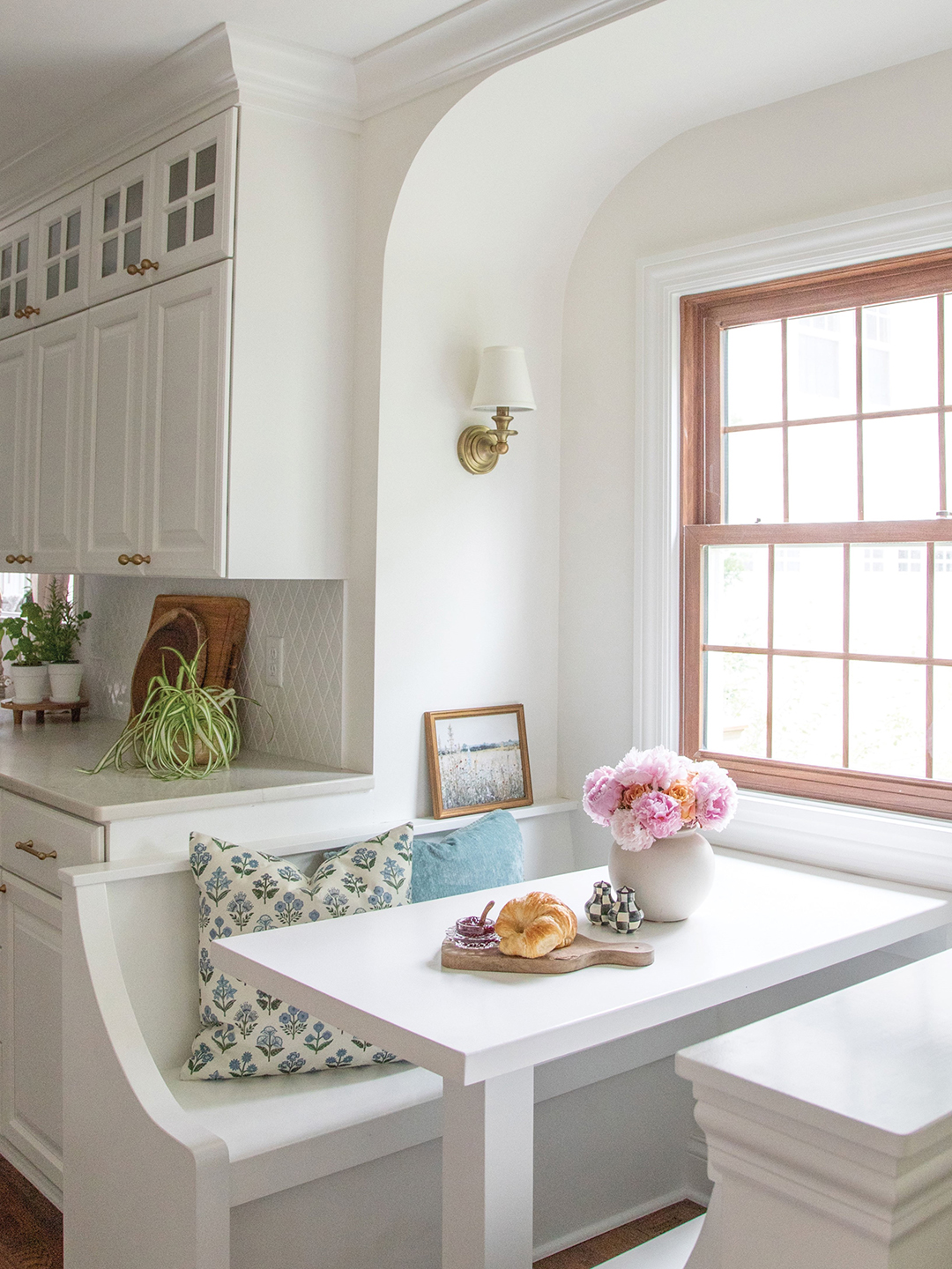 Molly Theno returned a closet to its original purpose as a breakfast nook, refreshing the space with paint and new fixtures.