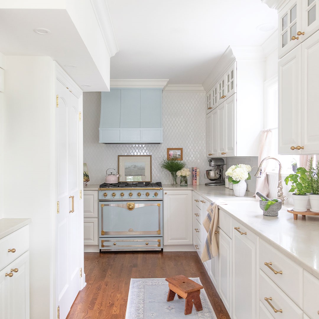 A light blue La Cornue range is a focal point of the kitchen.