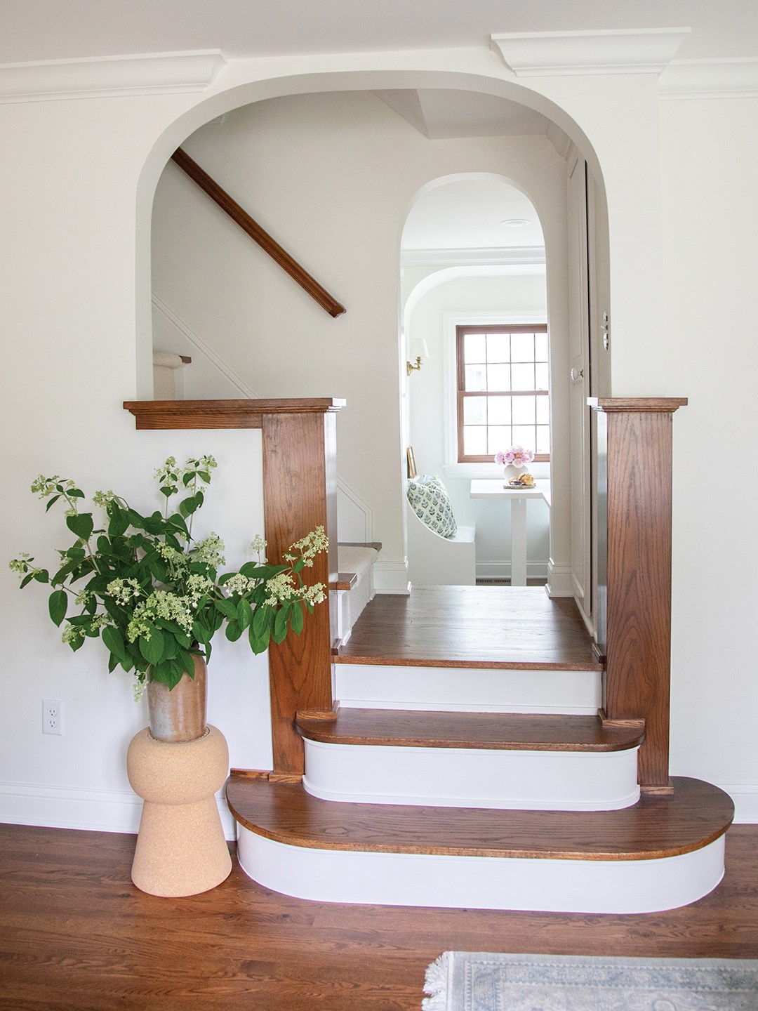 A door was removed to create an elegant passthrough from the entry to the kitchen.